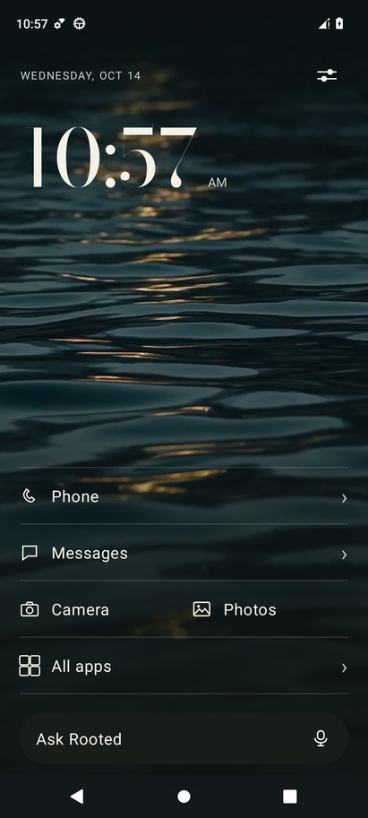 Rooted Home with full-screen Water wallpaper, the clock, everyday shortcuts and Ask Rooted